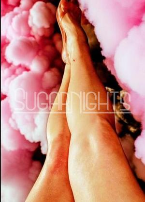 Lynn Monroe leg selfie in heels with a soft pink cloud effect